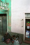 Woman and child outside the Bano Publico, Copacabana