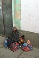 Woman and child at bus stop, Copacabana