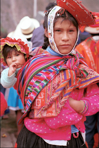 Indigeno woman and child at Ollantaytambo Sacred Valley Peru